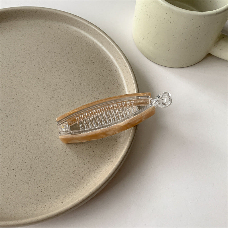 Resin banana hair clip in multicolours