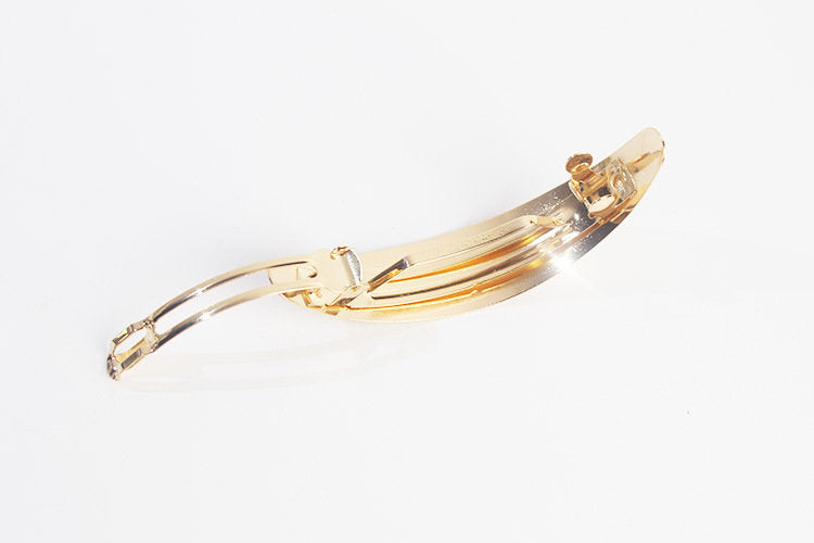 Oval barrette in matte metal