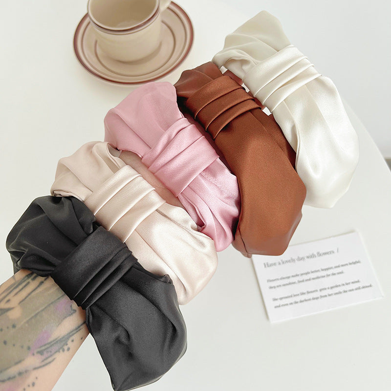 Large bow knotted satin headband