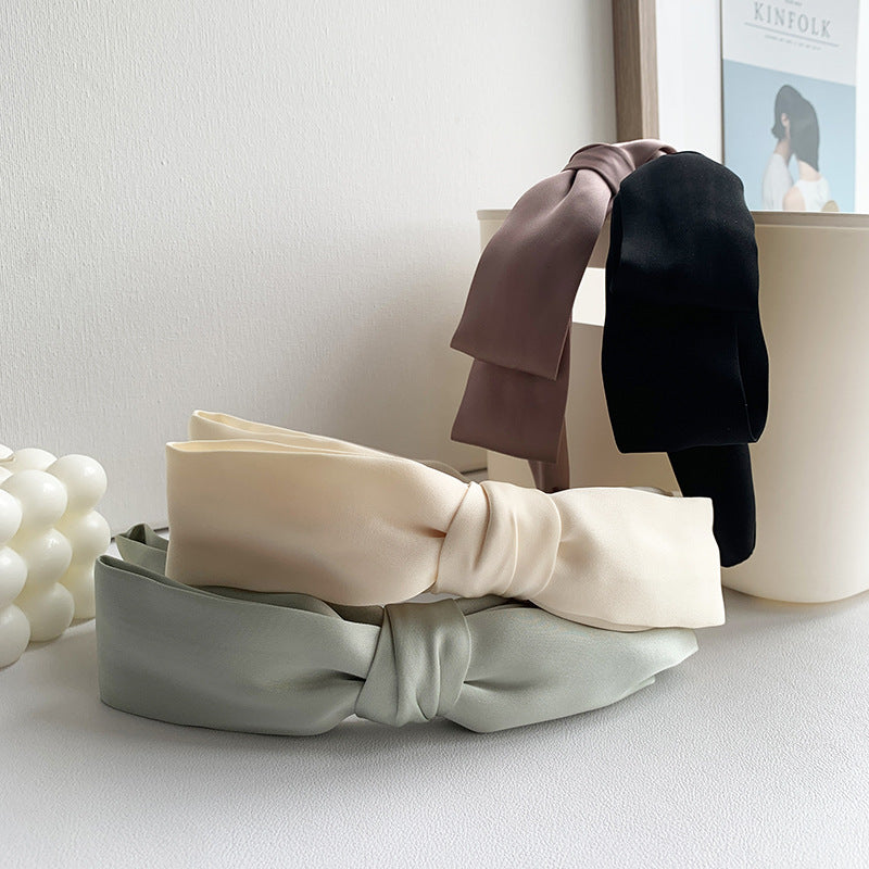Soft headband with large bow in plain colours