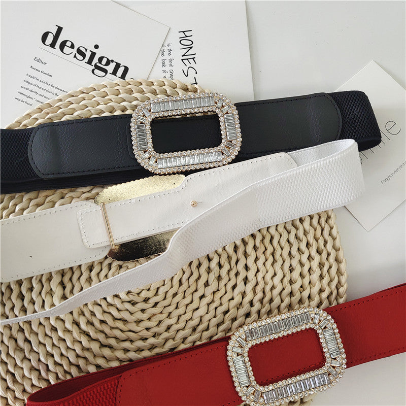Stretch wide belt with shiny gems studded buckle