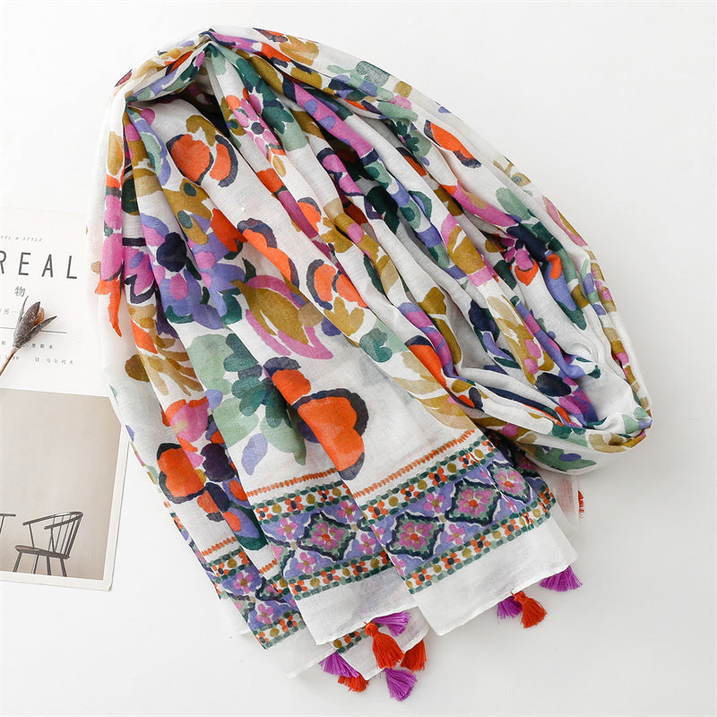 White beige long scarf with tassels with multicoloured flowers print