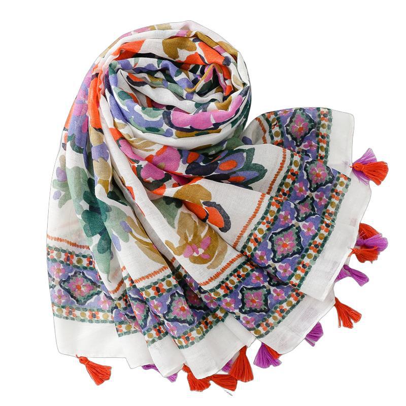 White beige long scarf with tassels with multicoloured flowers print