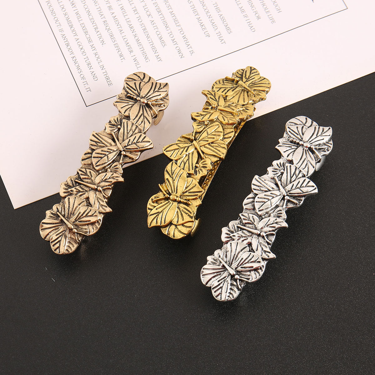 Antique metallic butterflies large hair barrette