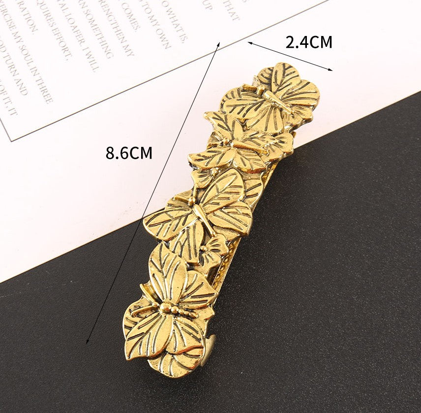 Antique metallic butterflies large hair barrette