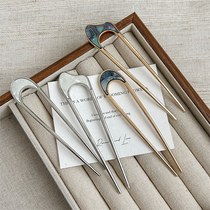 Metallic hair fork