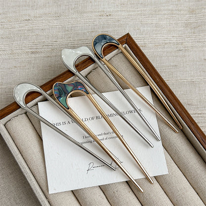 Metallic hair fork
