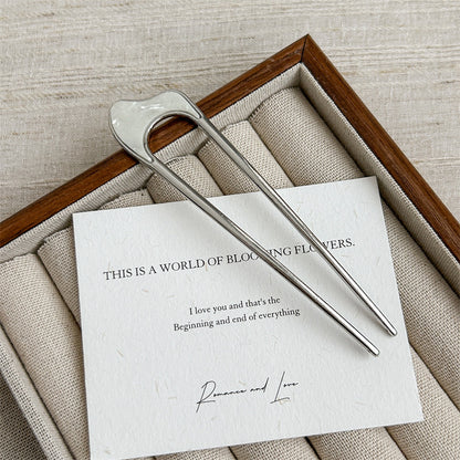 Metallic hair fork