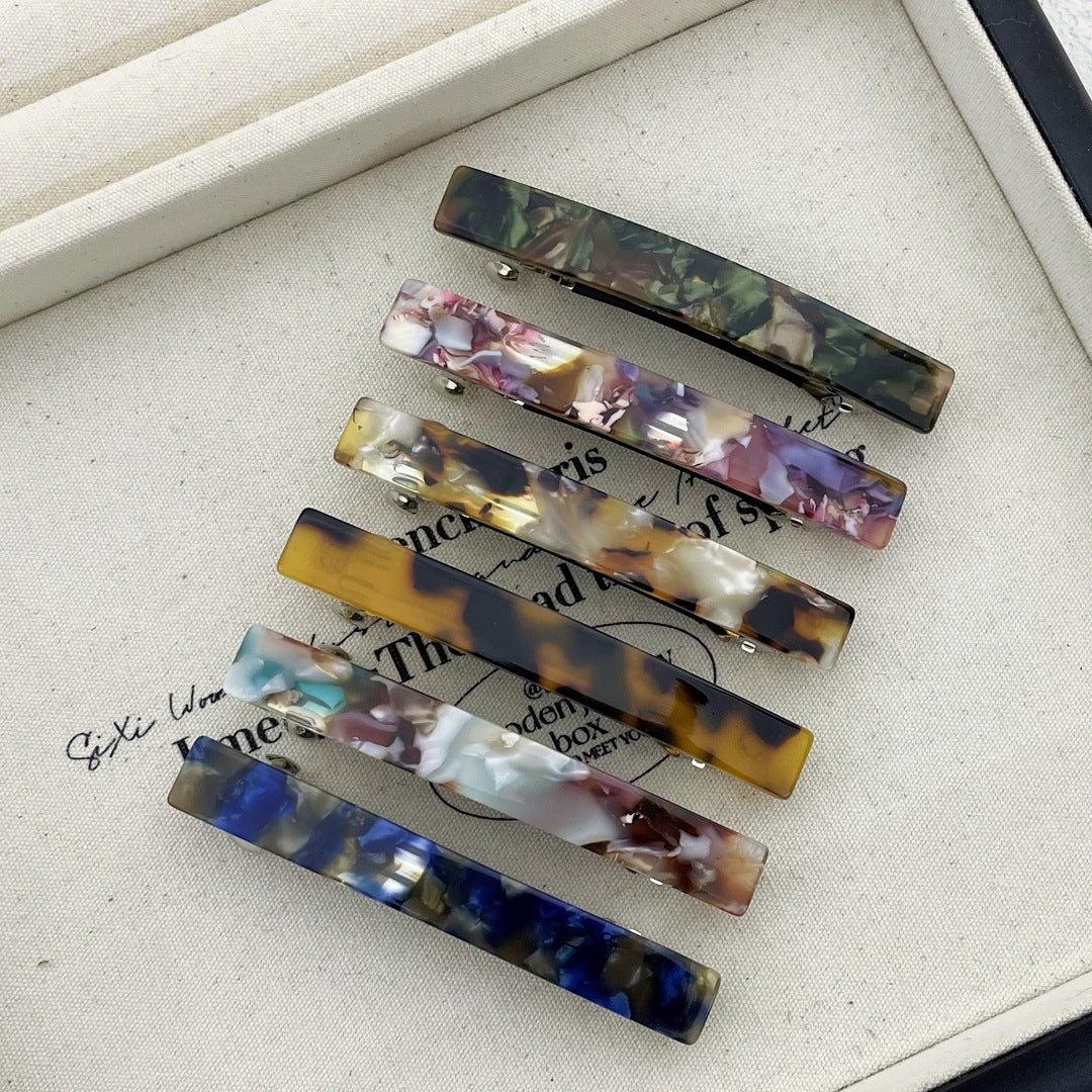 Small resin plain hair barrette