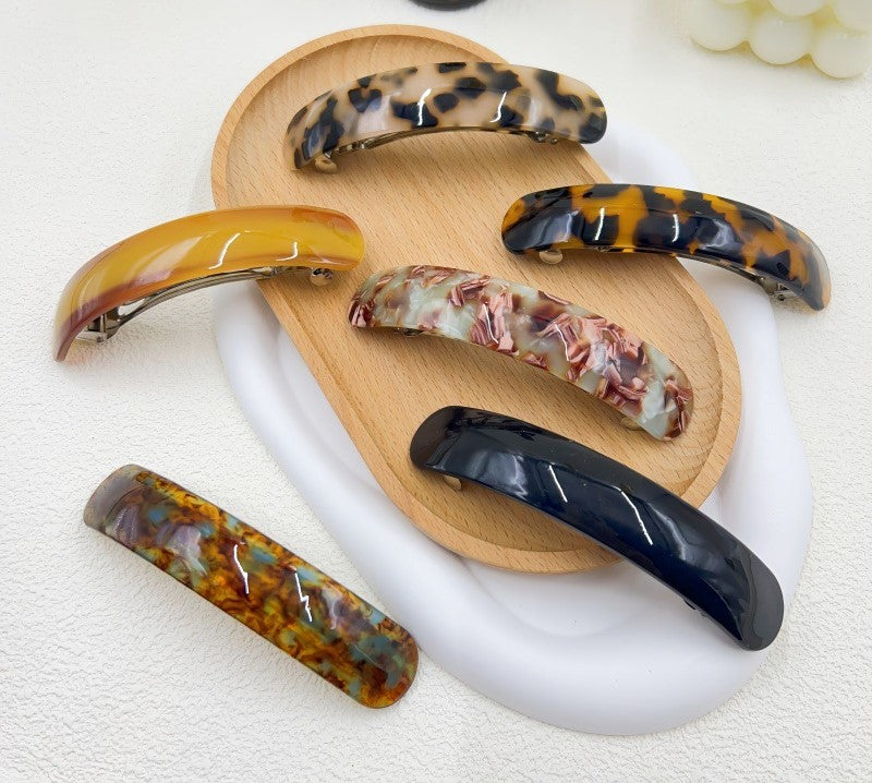 Smooth resin arch rectangle barrette