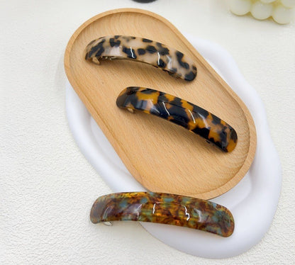 Smooth resin arch rectangle barrette