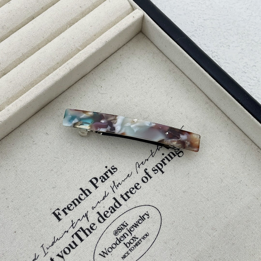 Small resin plain hair barrette