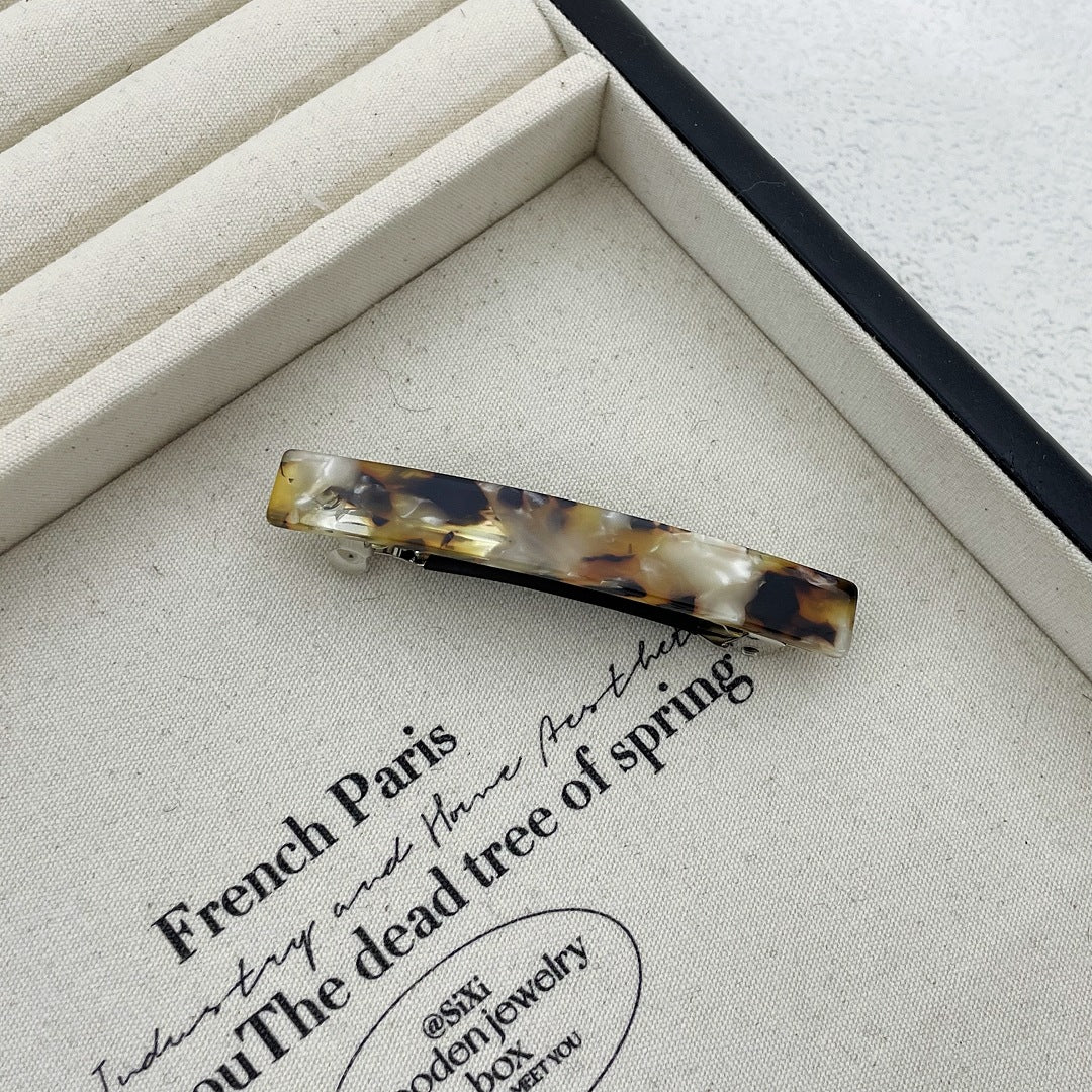 Small resin plain hair barrette