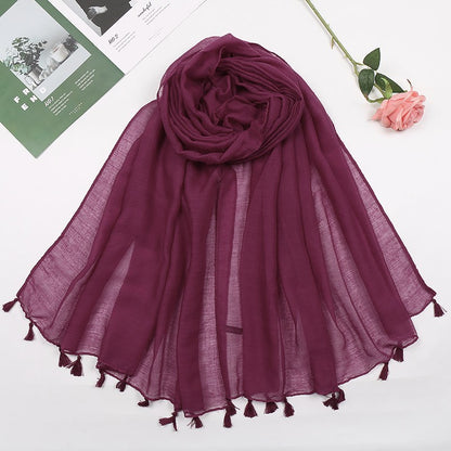 Plain long scarf with tassels