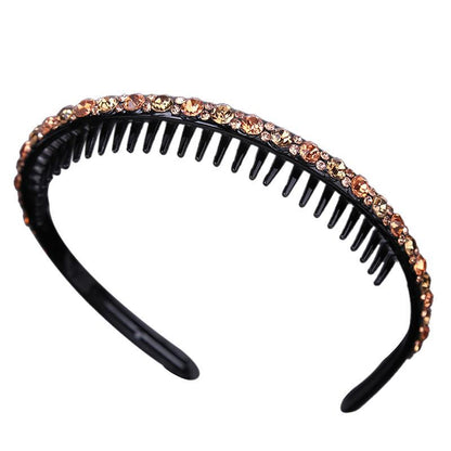 Rhinestone studded black acrylic headband with teeth