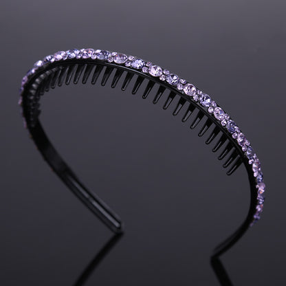 Rhinestone studded black acrylic headband with teeth