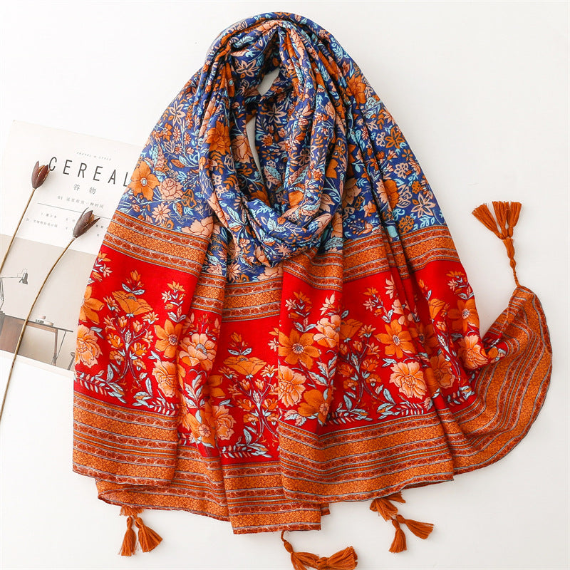 Multicoloured floral print scarf with tassels in burnt orange