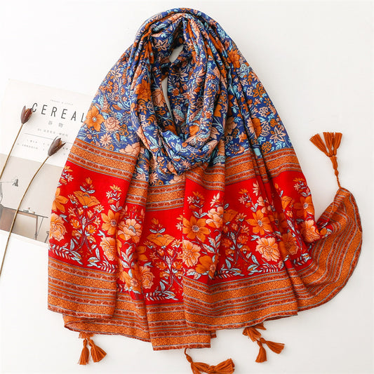 Multicoloured floral print scarf with tassels in burnt orange