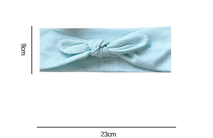 Knitted headband with bow