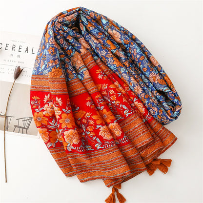 Multicoloured floral print scarf with tassels in burnt orange