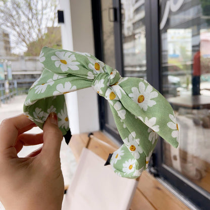 Daisy print headband with bow