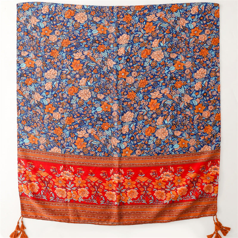 Multicoloured floral print scarf with tassels in burnt orange