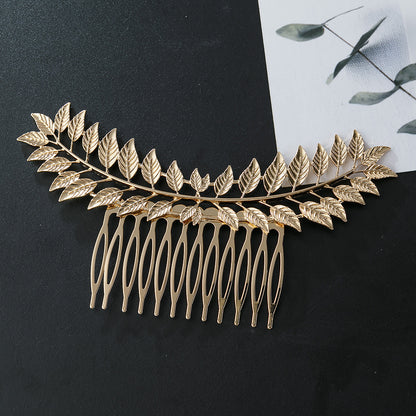 Large metallic leaf branch hair comb