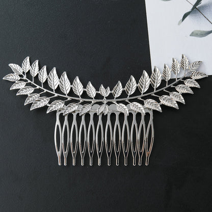Large metallic leaf branch hair comb