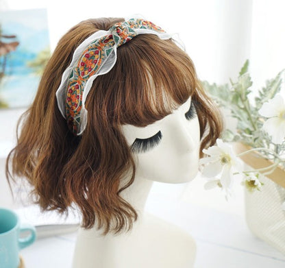 Organza edge stitched flowers knotted headband