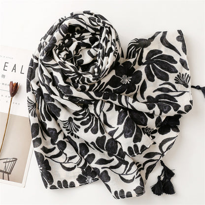 Black flowers print scarf with tassels