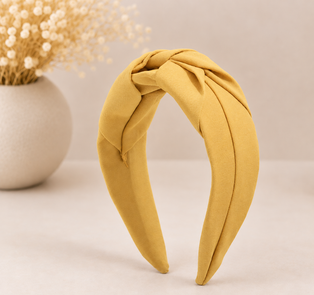 Twist knotted top headband