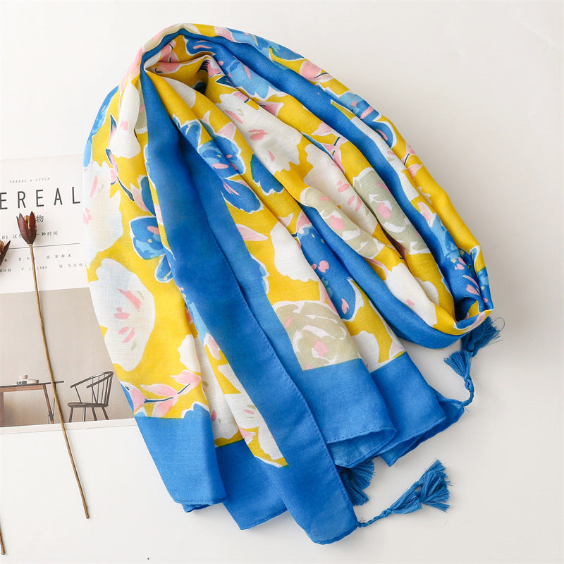 Large flowers print sky blue edged yellow scarf with tassels