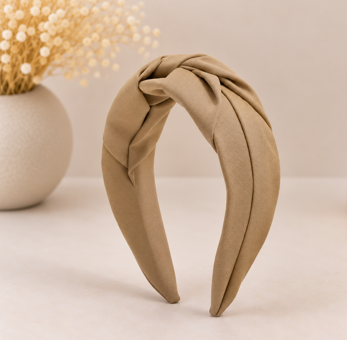 Twist knotted top headband
