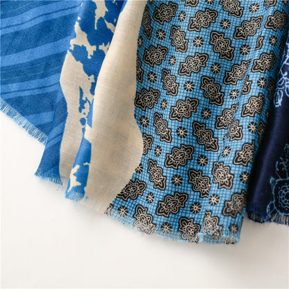 Multi-patterned long scarf with tassels in blue