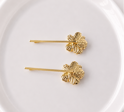 Metallic flower hair slides