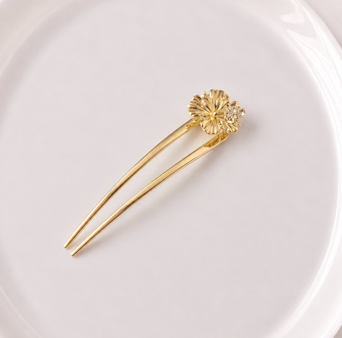 Metallic flower hair fork