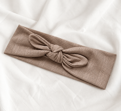 Knitted headband with bow
