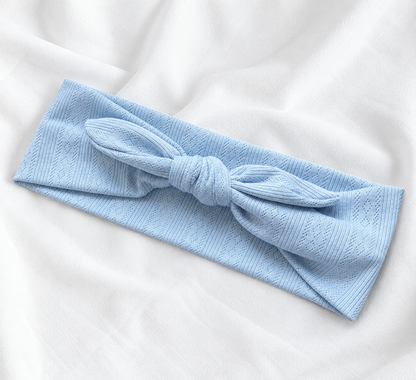 Knitted headband with bow