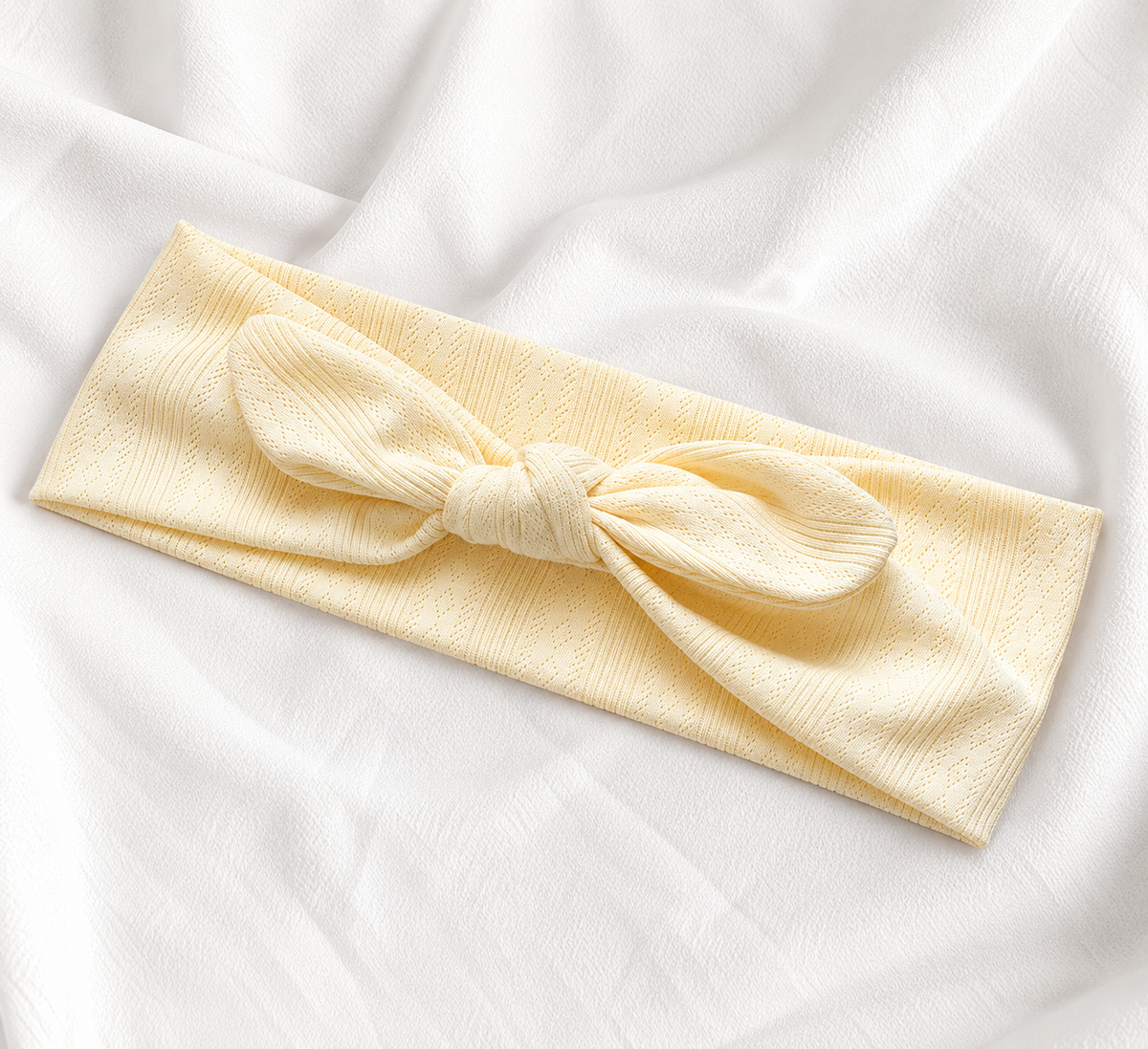 Knitted headband with bow