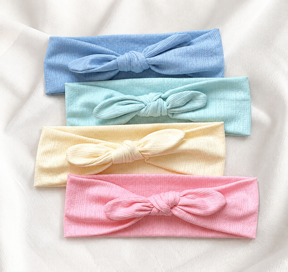 Knitted headband with bow