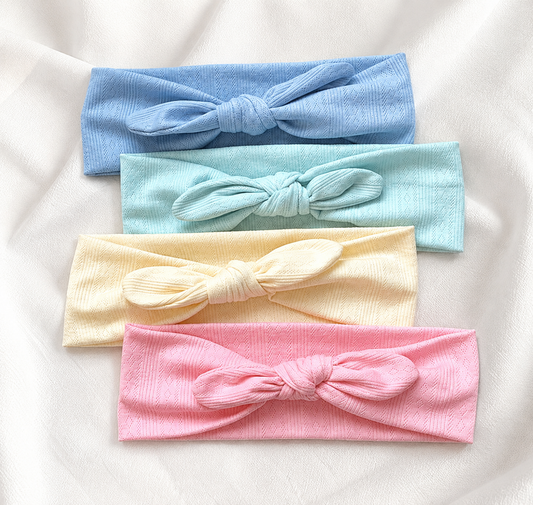 Knitted headband with bow