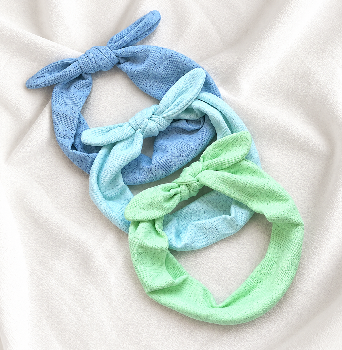 Knitted headband with bow