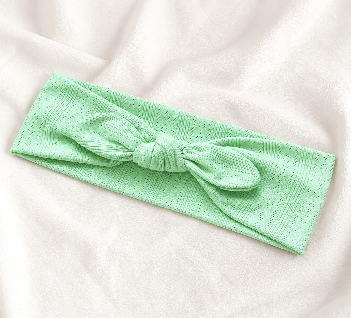 Knitted headband with bow