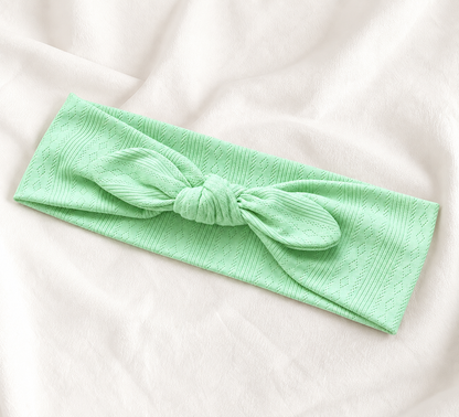 Knitted headband with bow