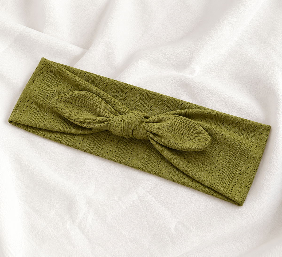 Knitted headband with bow