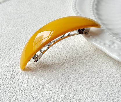 Oval acrylic hair barrette