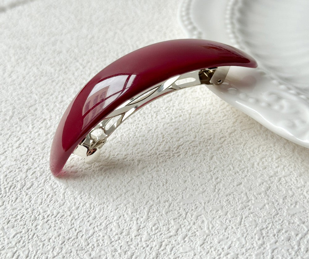 Oval acrylic hair barrette