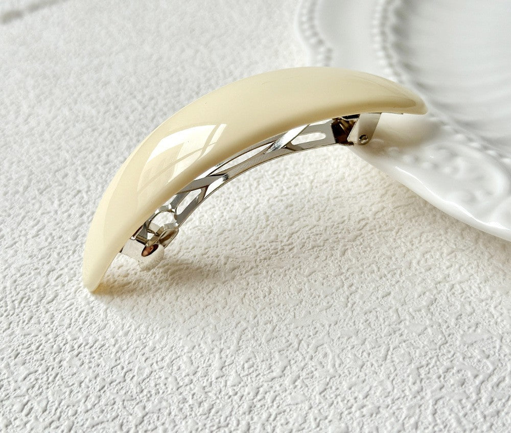 Oval acrylic hair barrette