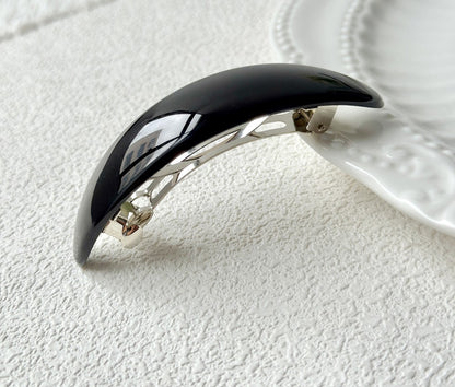 Oval acrylic hair barrette