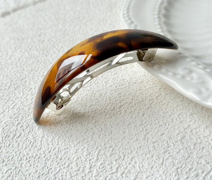 Oval acrylic hair barrette